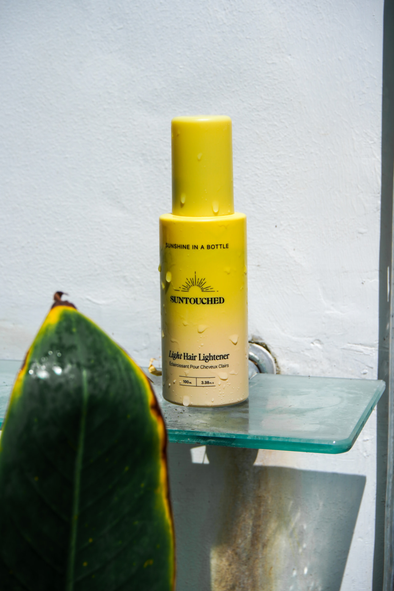 Suntouched hair lightener photographed in bright natural light